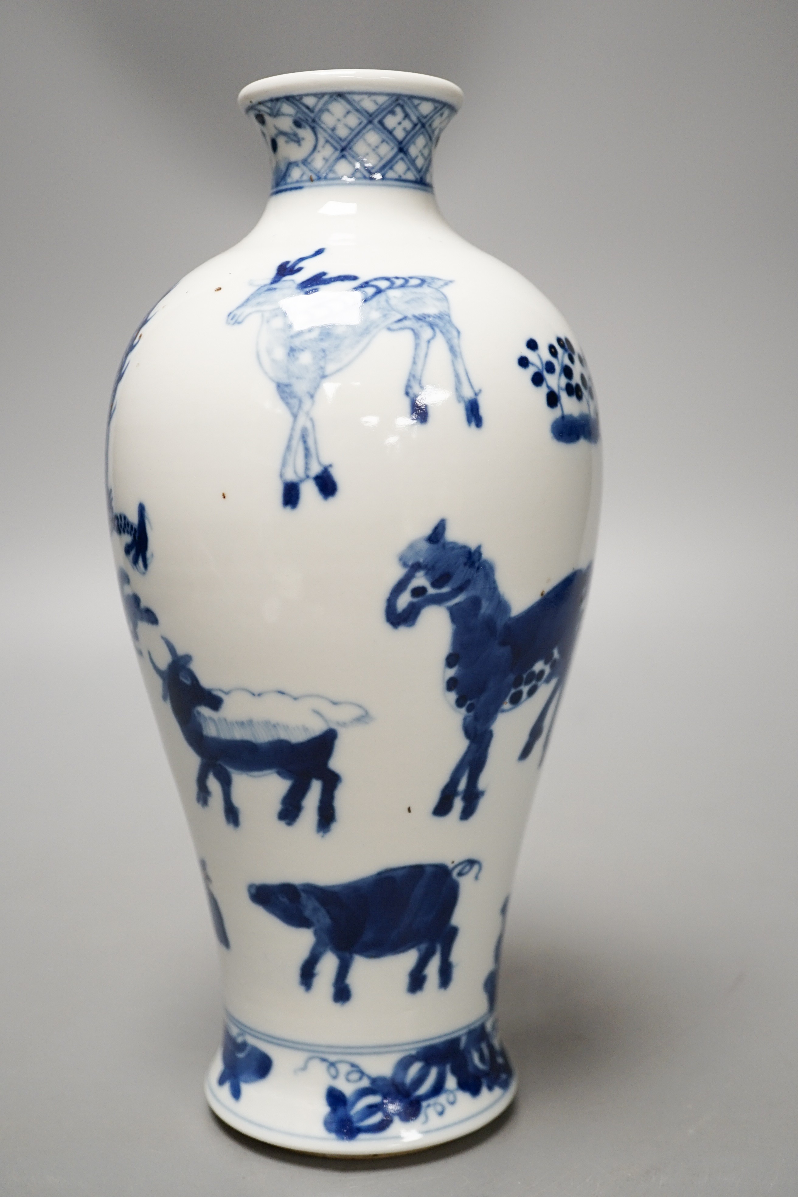 A Chinese blue and white ‘zodiac animals’ vase 23.5cm